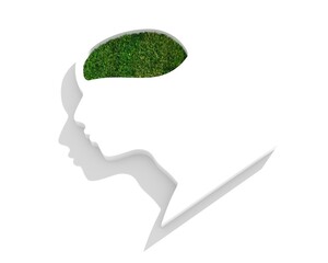 Profile of the head of a man with green grass