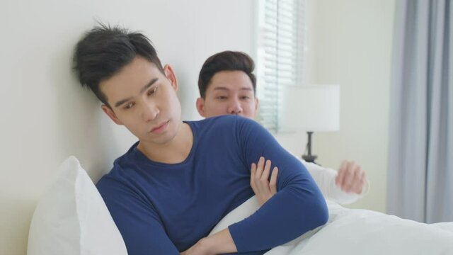Asian handsome gay couple apologizing offended boyfriend for mistake