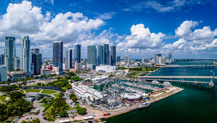 panoramic aerial drone shot of Miami Beach, Florida with city, sky and clouds 

