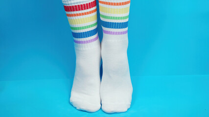 Concept shooting of white socks with rainbow colors, allegory