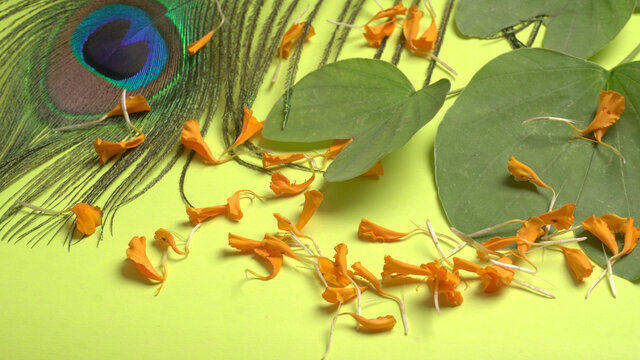 Indian Festival Dussehra, showing golden leaf and flowers on moody background. Greeting card.