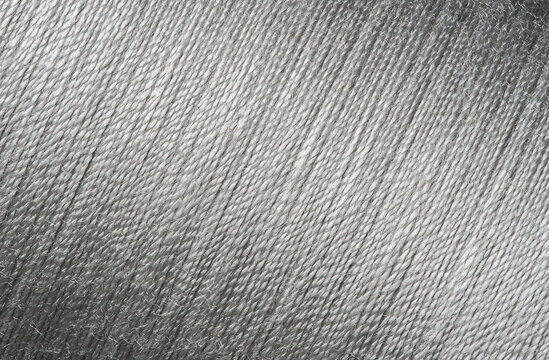 Close up picture of silver thread texture, diagonal line