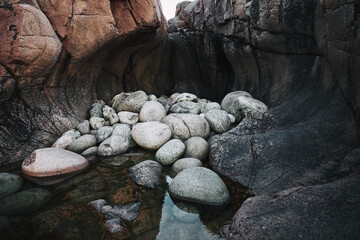 cave with large round stones