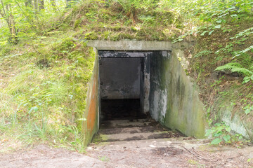 Entrance to historical bunker at Hel Peninsula near Baltic sea. - obrazy, fototapety, plakaty