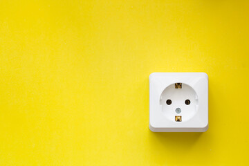 white socket  on yellow background