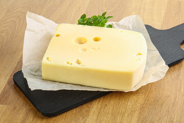 Maasdam cheese over the board