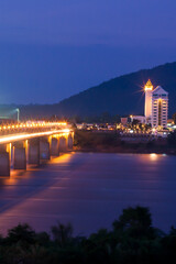 Pakse Bridge over the Mekong River at dusk.