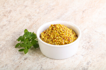 Grain mustard sauce in the bowl