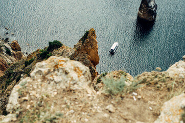 The yacht is at sea. A boat on the water. The sea coast.