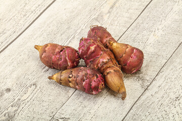 Raw topinambur root or Jerusalem artichoke