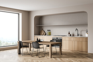 Minimalist beige wood kitchen with niche. Corner view.