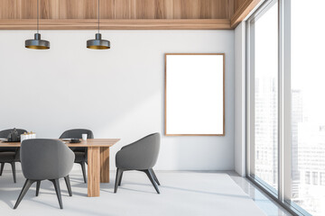 Empty frame on white dining room wall