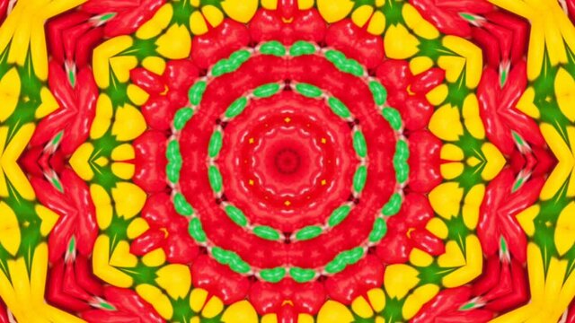 A kaleidoscopic futuristic wallpaper in vibrant green, yellow and red colors