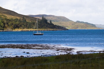 Boat on the sea in a bay on Jura