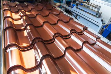 Brown metal roof tiles made from galvanized and painted steel sheet roll.