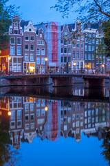 Fototapeta na wymiar Houses With Reflections in Amsterdam in the Early Morning