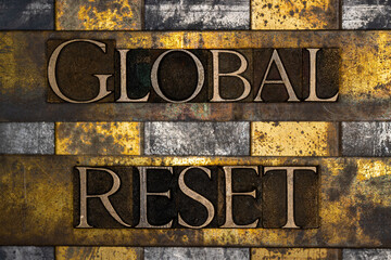 Global Reset text on textured grunge copper and vintage gold background