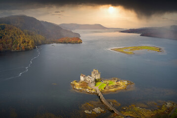Eilean Donan castle aerial view from above at sunrise