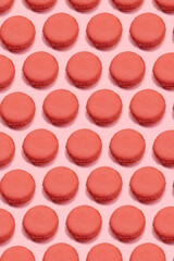 delicious macaroons on pastel color background