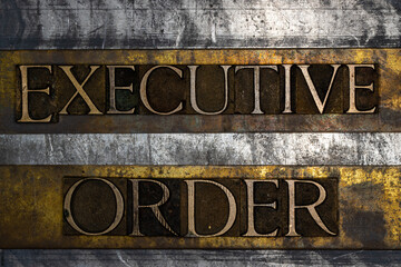 Executive Order text on textured grunge copper and vintage gold background