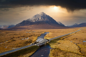 Buachaille Etive Mor aerial during autumn view of A82 road and bridge - obrazy, fototapety, plakaty