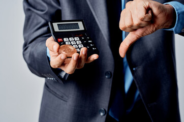 bearded man calculator bitcoin in hand counting finance studio official