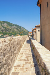 Fototapeta na wymiar Montenegro. Old Town of Kotor, UNESCO World Heritage Site. Footpath on defensive wall of ancient fortifications