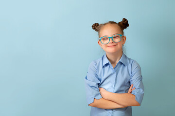 Happy girl with Down syndrome having fun and laughing in the studio