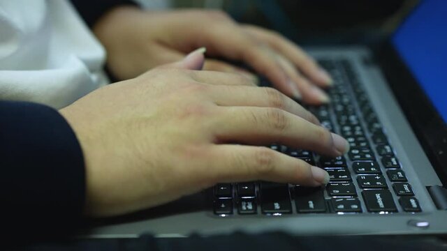 specialist programmer hand typing on keyboard on laptop check or command on software for run system at operation data center office for network engineering technology concept