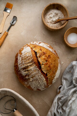 Homemade sourdough bread on rustic background. Top view, cooking healthy food