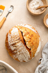 Homemade sourdough bread on rustic background. Top view, cooking healthy food