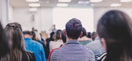 Woman giving presentation on business conference.