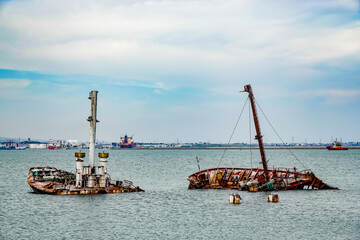 An old sunken ship in the harbor