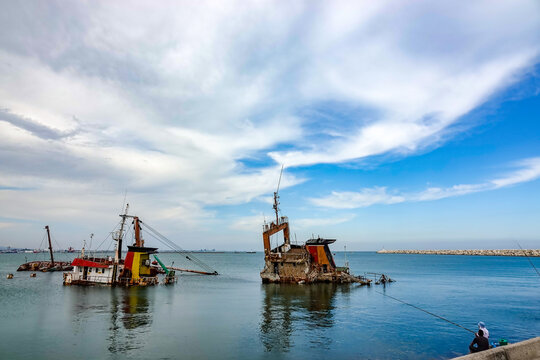 An old sunken ship in the harbor