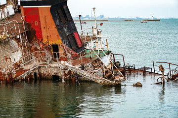 An old sunken ship in the harbor
