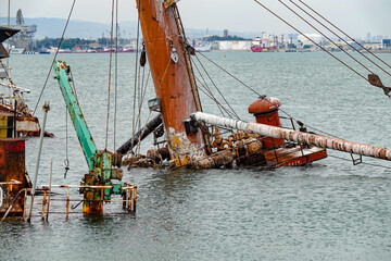 An old sunken ship in the harbor