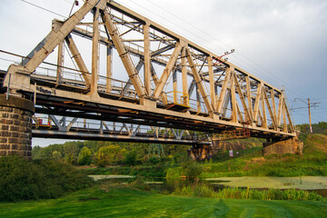 Railway bridge over the river close-up. Railway