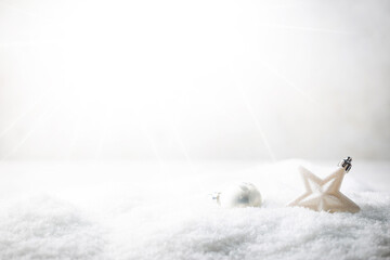 Christmas white decorations star and boll on snow. Winter Decoration Background