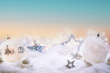 Christmas white decorations on snow with christmas lights. Winter Decoration Background