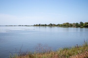 Water surface and trees in the distance
