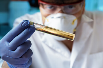 doctor holding urine tube test in laboratory for analysis in urine chemistry. Technician lab with...