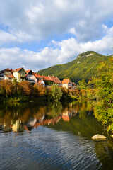 Fototapeta na wymiar Fronleiten, a beautiful tourist town in Austria. Lake and mountains in the city in autumn.