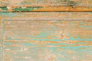 Rough wooden background in green and yellow colors.