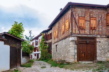 Old village house made of wood and stone.