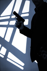 Spy thriller book cover design with man holding pistol gun.