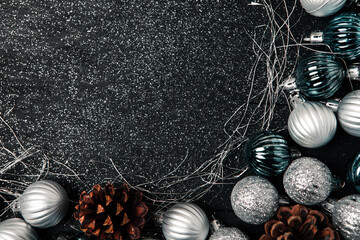 Christmas frame background with copy space. Merry Christmas and Happy New Year banner with tree balls and pine cones.