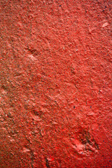 wall texture in red tone. background for design.