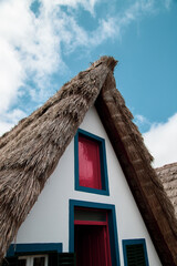 Fototapeta na wymiar Traditional houses from Madeira Island in Santana