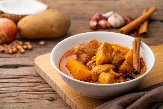 Massaman Curry with pork meat in white bowl