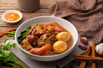 Stewed pork leg with five spices in sweet gravy sauce and eggs